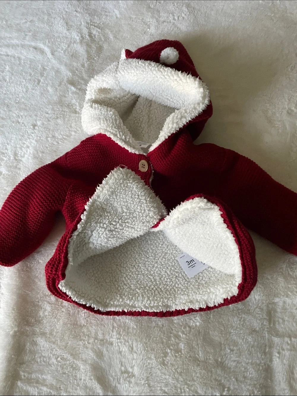 Carter’s size 3 mos fleece-lined red knit cardigan w/hood